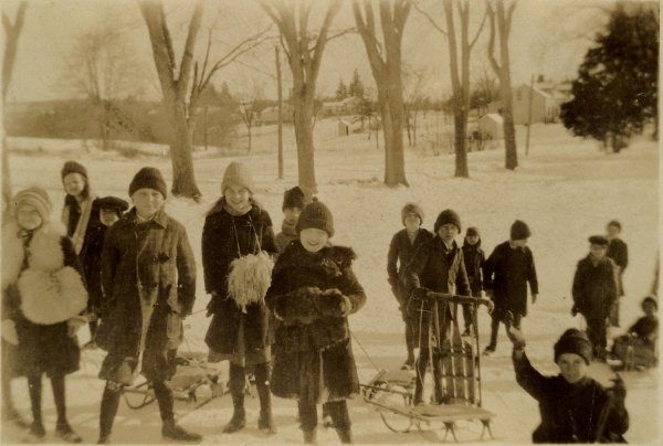 Children sledding in Dobsonville